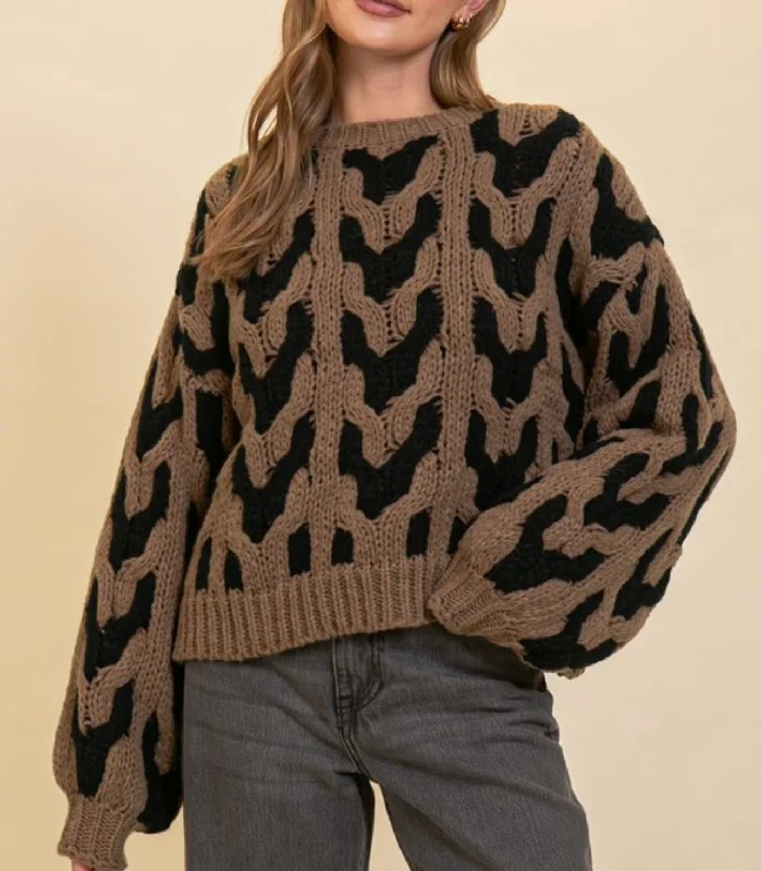 Studded Knit TopsBold black and brown cable knit sweater